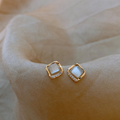 Elegant Earrings with Moon Crystal in Gold